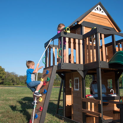 Backyard Discovery Canyon Creek Cedar Wood Swing Set with Wave Slide, Clubhouse, Play Kitchen, Picnic Area, Belt Swings, Web Swing, Rock Wall, Balconies, Playhouse, Step Ladder, Outdoor Playset